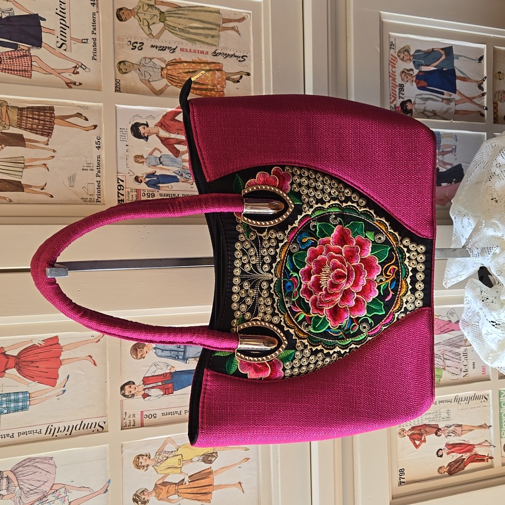 Hot pink woven embroidered bag